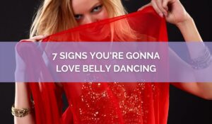 Image with belly dancer and red veil with text saying "7 Signs You're Gonna Love Belly Dancing"