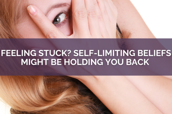 Blonde women hiding behind her handsFeeling Stuck? Self-Limiting Beliefs Might Be Holding You Back